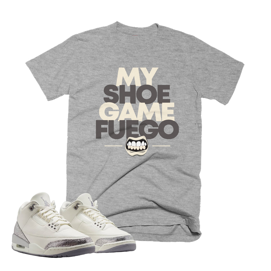 Heather Grey T-shirt with an Fuego design on the front