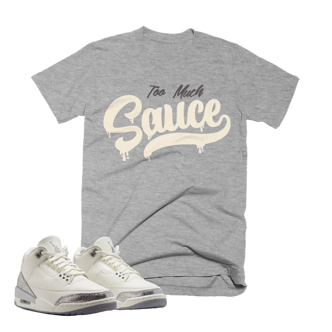 Heather Grey T-shirt with an too much sauce design on the front