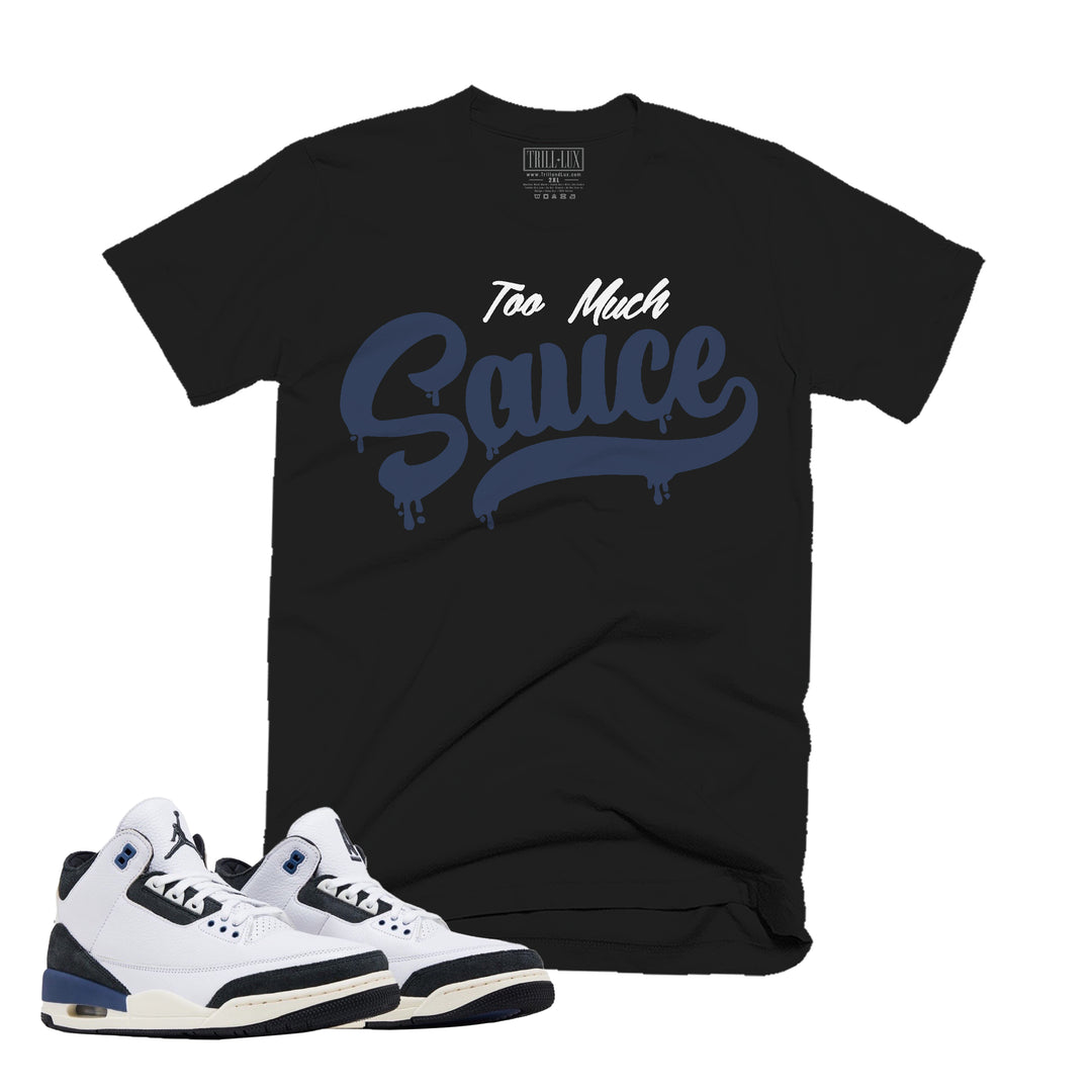 black T-shirt with a sauce design on front