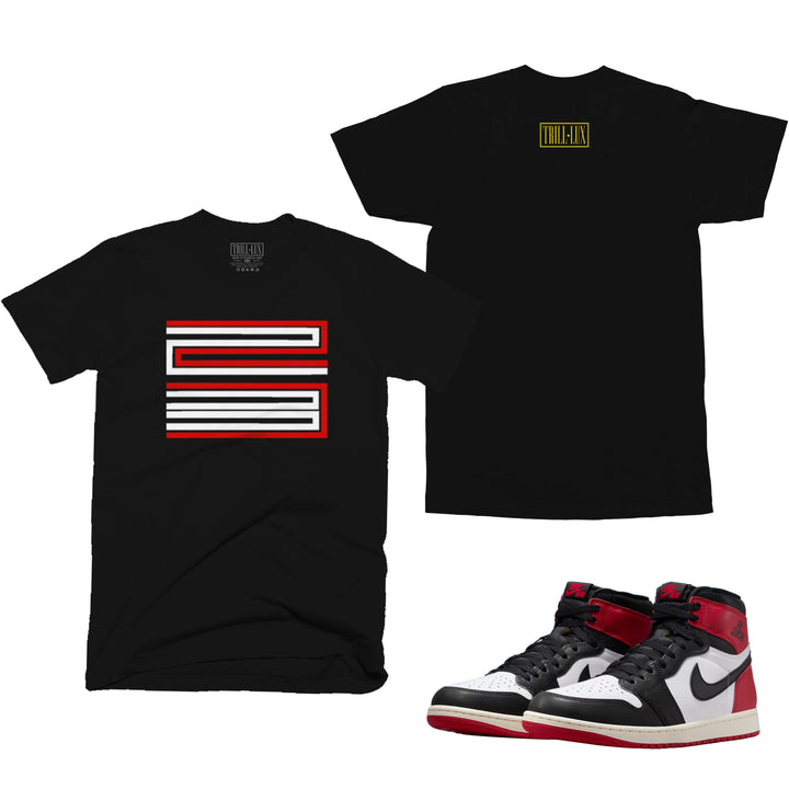 black T-shirt with 23 design on front made to match jordan 1 black toe Reimagined shoes