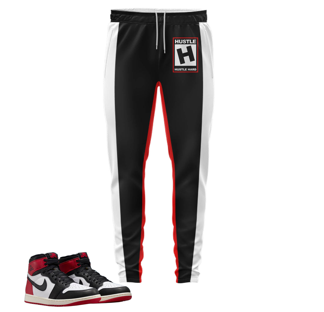 black jogger outfit set with rated hustle on front with color block stripes down the side made to match jordan 1 black toe Reimagined shoes