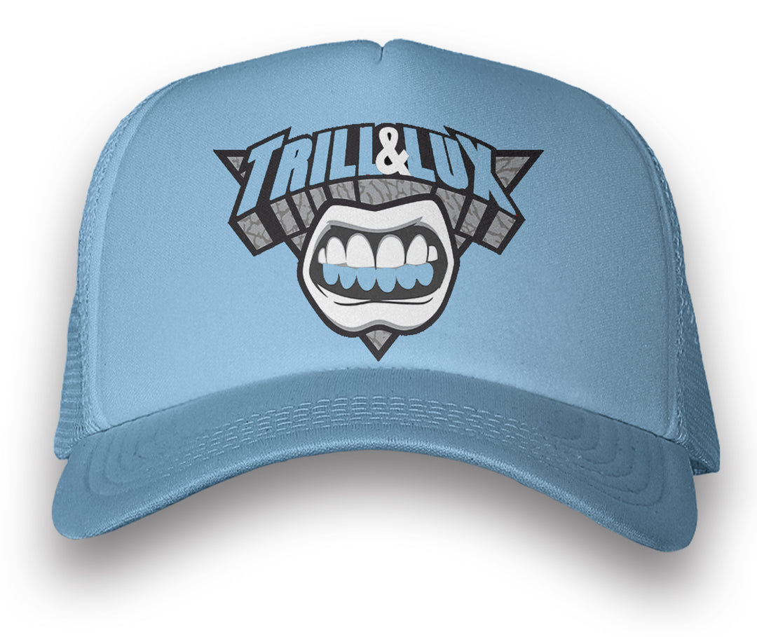 Jordan 1  University blue trucker hat with trill and lux grill  graphic on the bill cap